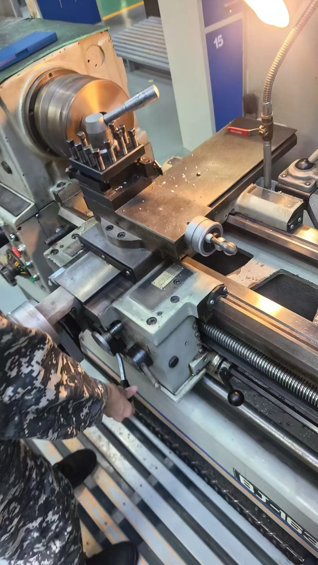 Operating the lathe during practice